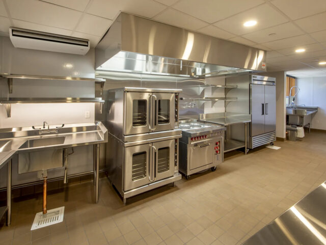 https://tudorhvac.com/wp-content/uploads/2026/07/ME_PCFY_Trane_Mech_Industrial_kitchen_1575c49116-mitsubishi-commericla-ceiling-suspnded-640x480.jpg
